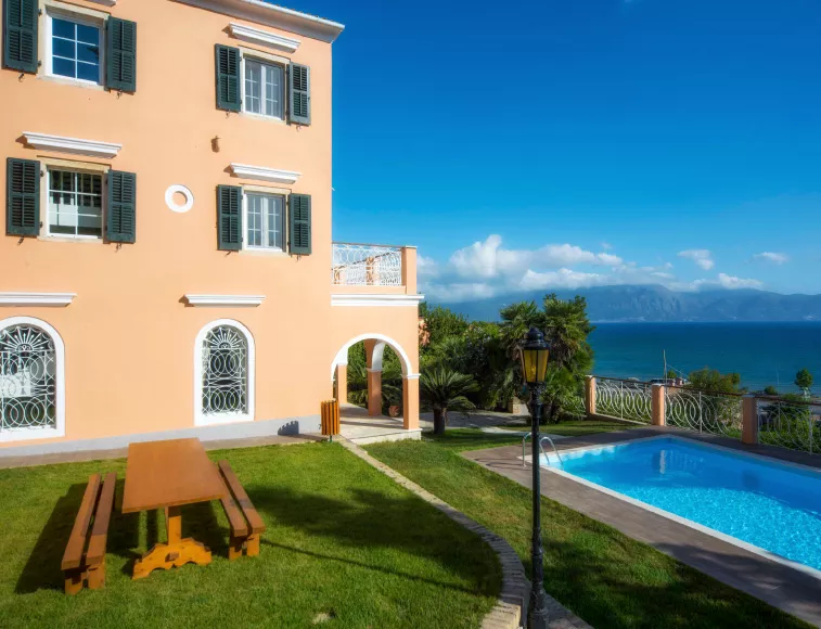 Luxury Villa 1870 Corfu with a salted swimming pool and view to the Ionian Sea.