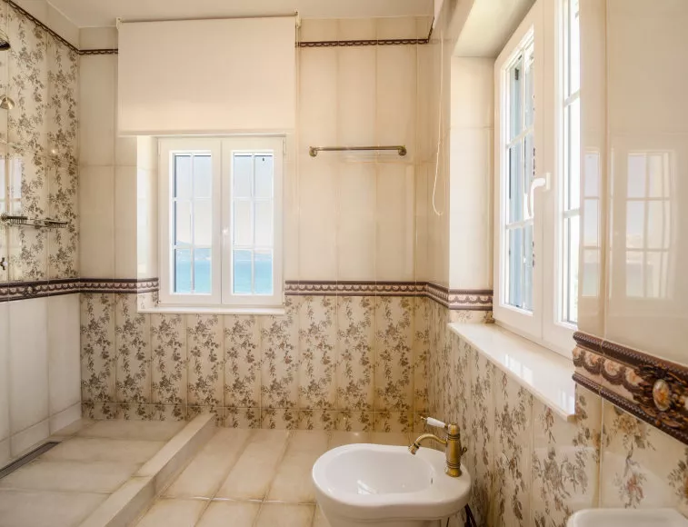 The brown beige 2nd floor bathroom, with a view to the Ionian!